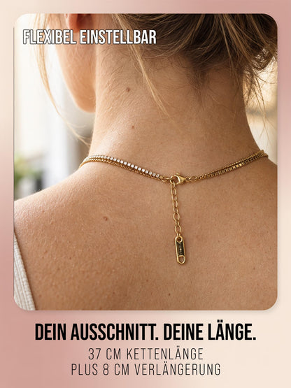 Rückansicht der Daily Spark Halskette in Gold mit Karabiner, Verlängerungskette und THIORA-Tag